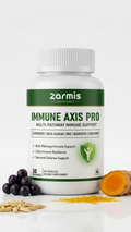 A white bottle of Zarmis Life Sciences 'Immune Axis Pro' dietary supplement, styled with fresh ingredients (blueberries, turmeric root, and oats) on a clean white background.