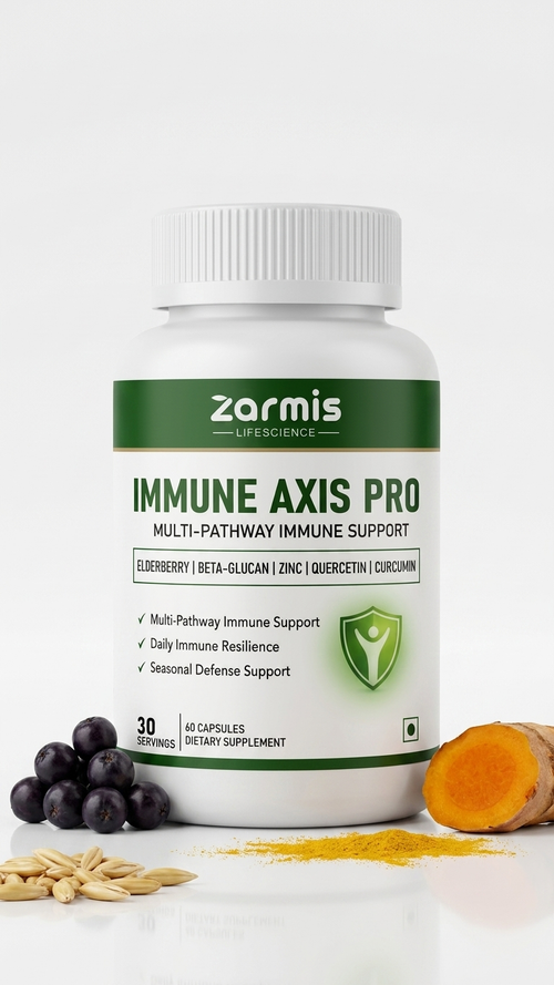 A white bottle of Zarmis Life Sciences 'Immune Axis Pro' dietary supplement, styled with fresh ingredients (blueberries, turmeric root, and oats) on a clean white background.